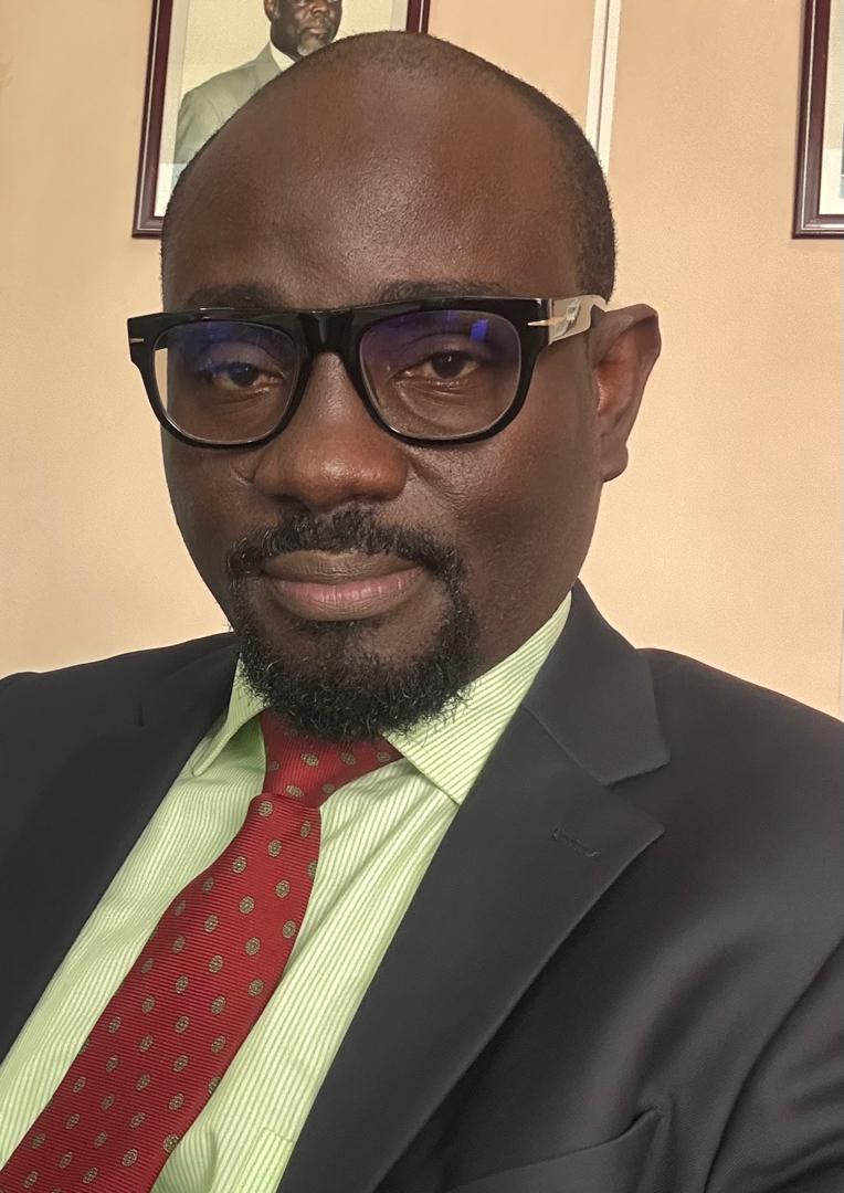 Dr. Paul Kitata